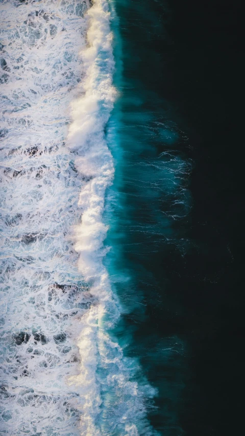 water is coming into the shore at night