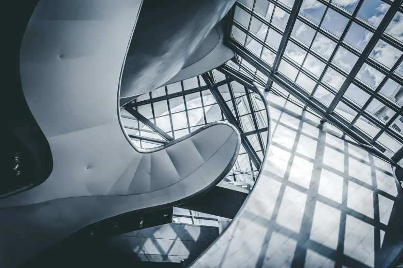 a stair that is in a building with glass walls