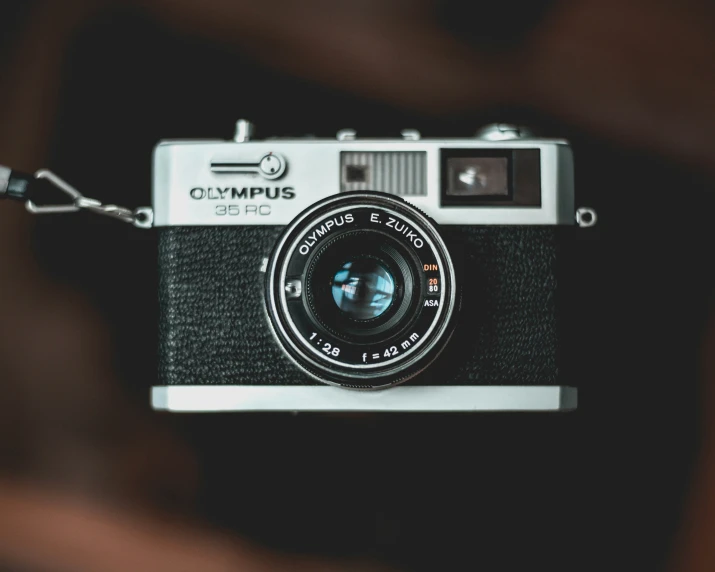 a old and retro - styled camera taken from below