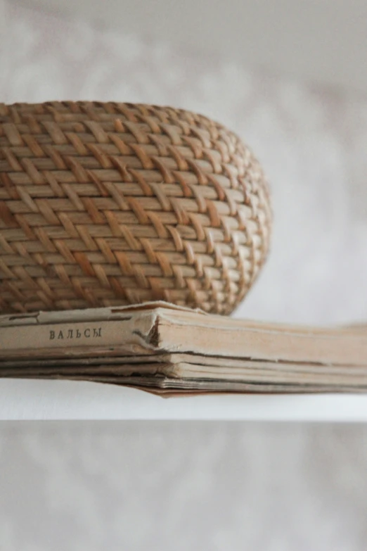 a basket is on top of a book