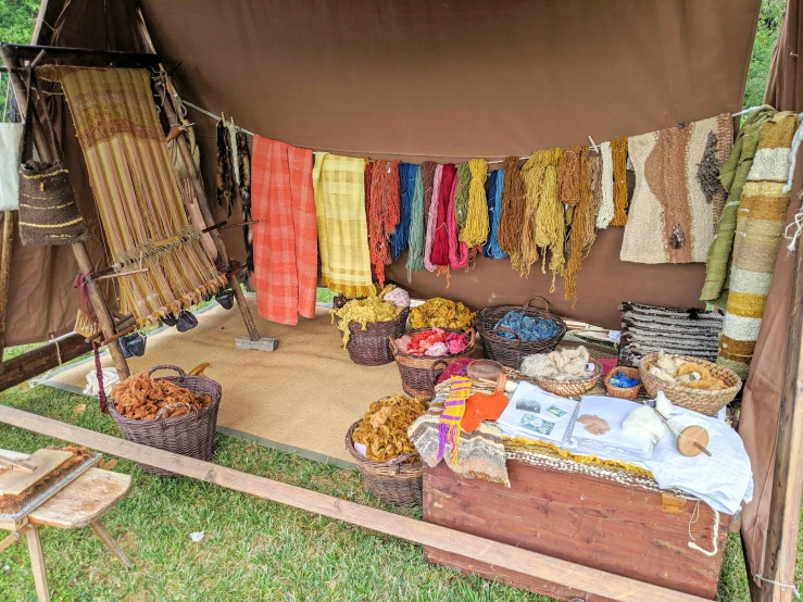 a cloth market has different types of goods displayed