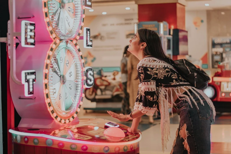 there is a woman leaning against a clock