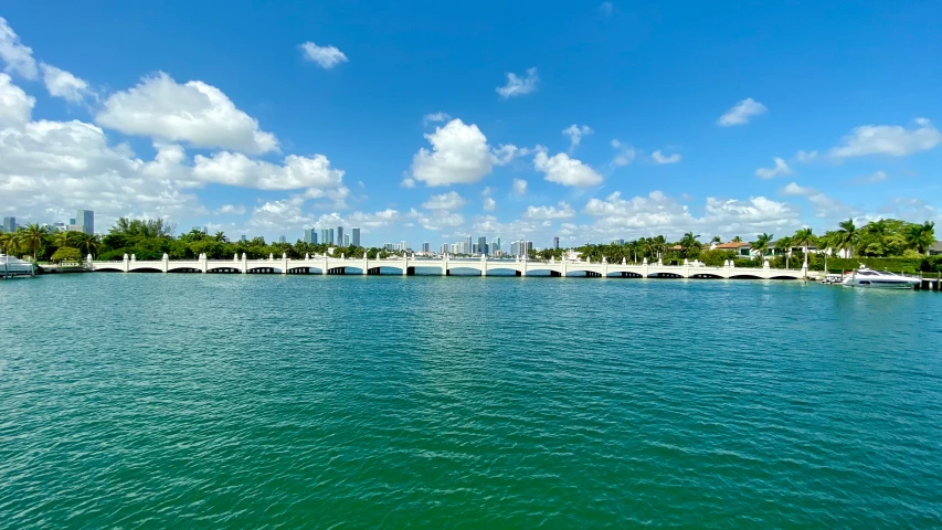 a picture of the water and bridge on top