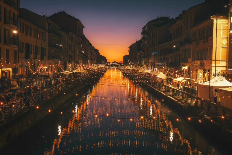 an image of some buildings that are at night