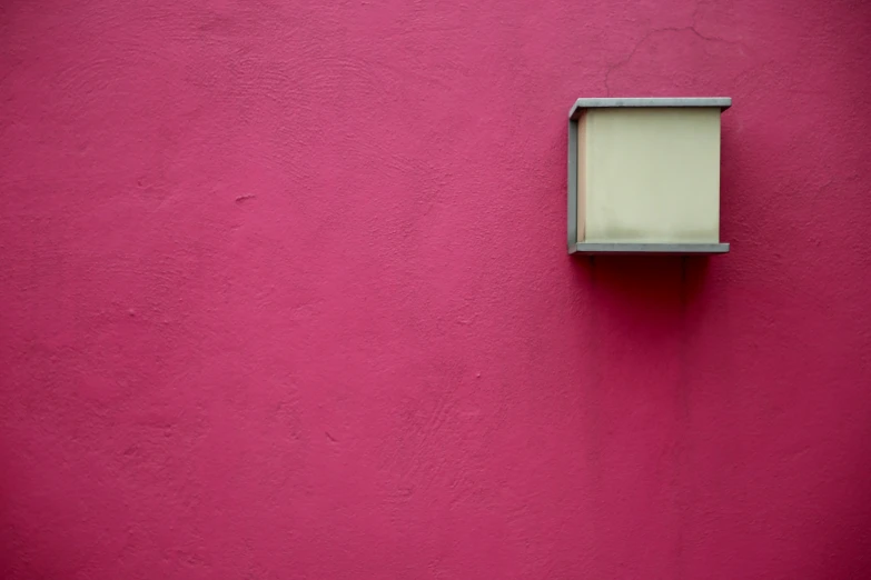 this is an image of a red stucco building