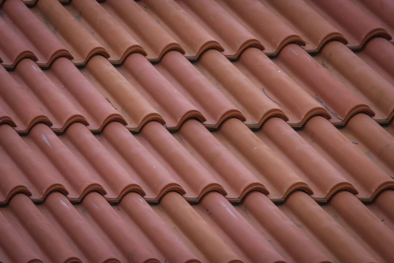 an image of many brown roof tiles