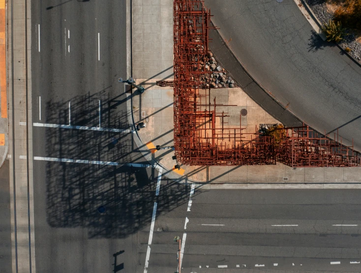 there is a yellow structure along the road