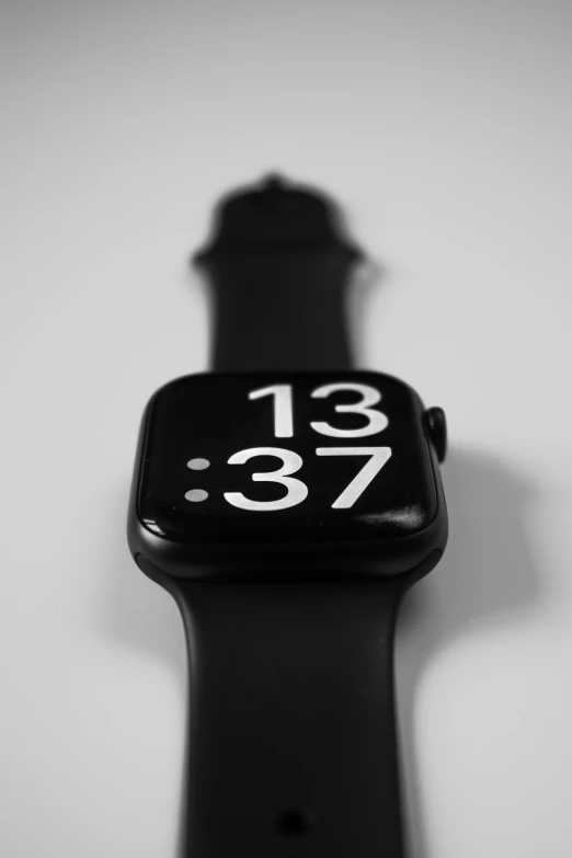 an apple watch with a clock face painted on the screen