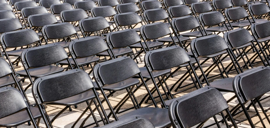 a big bunch of chairs that are set up