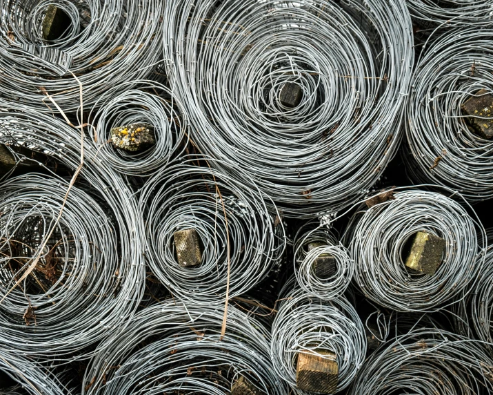 a stack of old rolled and twisted wires