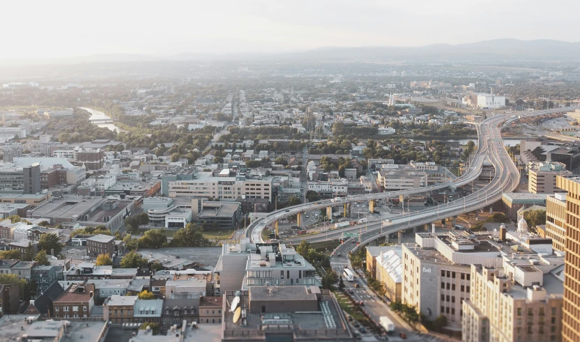 the city is covered with several freeways, street lights and buildings