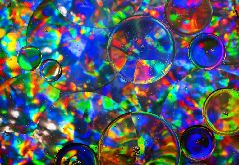 the bubbles are covered in a multi - colored pattern