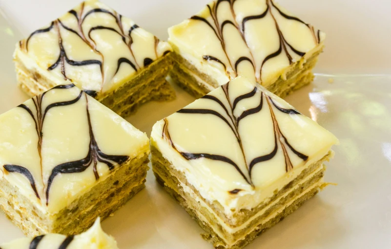 several squares of cake are shown on the plate