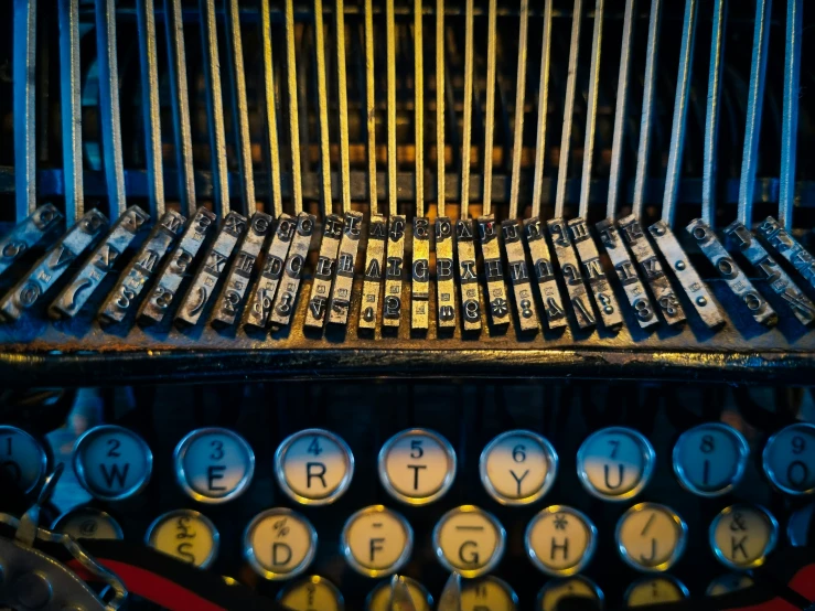 a close - up of an old typewriter with keys and letters on the keys