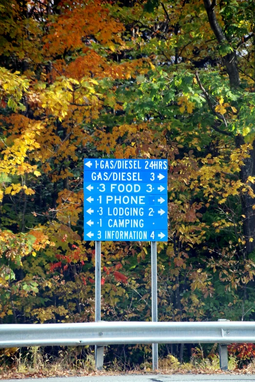 a road sign points the way to the four roads