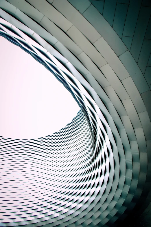 the inside of a building with curved lines