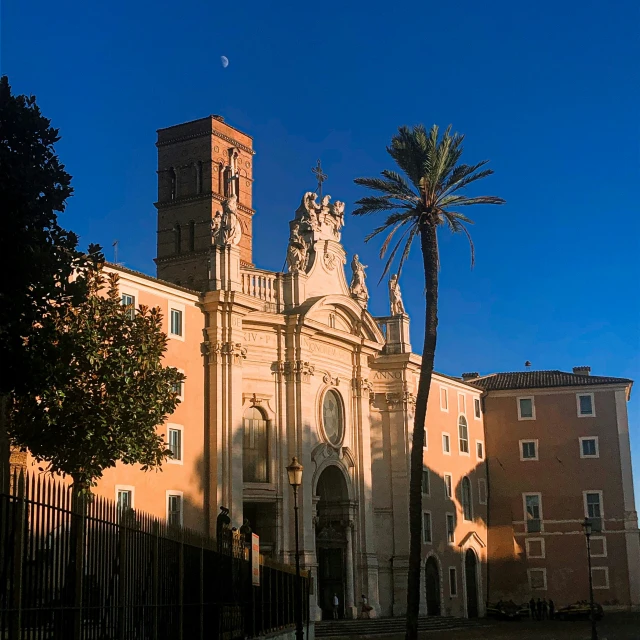 a tall church with a steeple and a tower