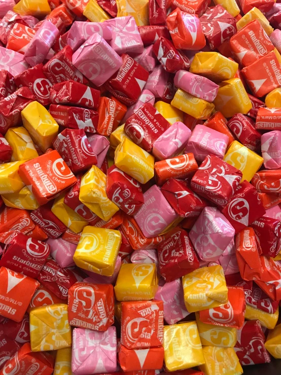 colorful candy bars in a pile together