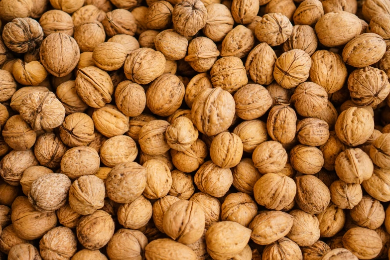 a pile of nuts laying in a basket