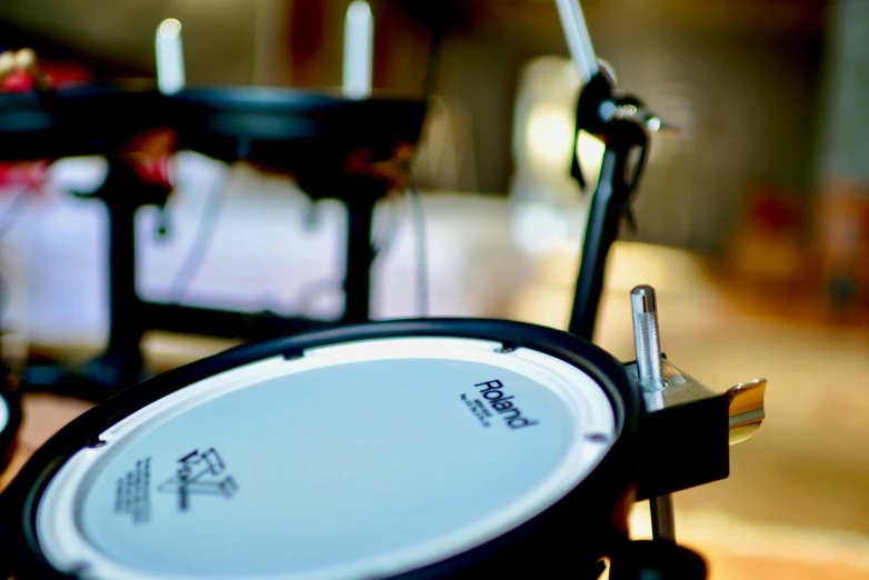 a close up of a small object that looks like a drum set