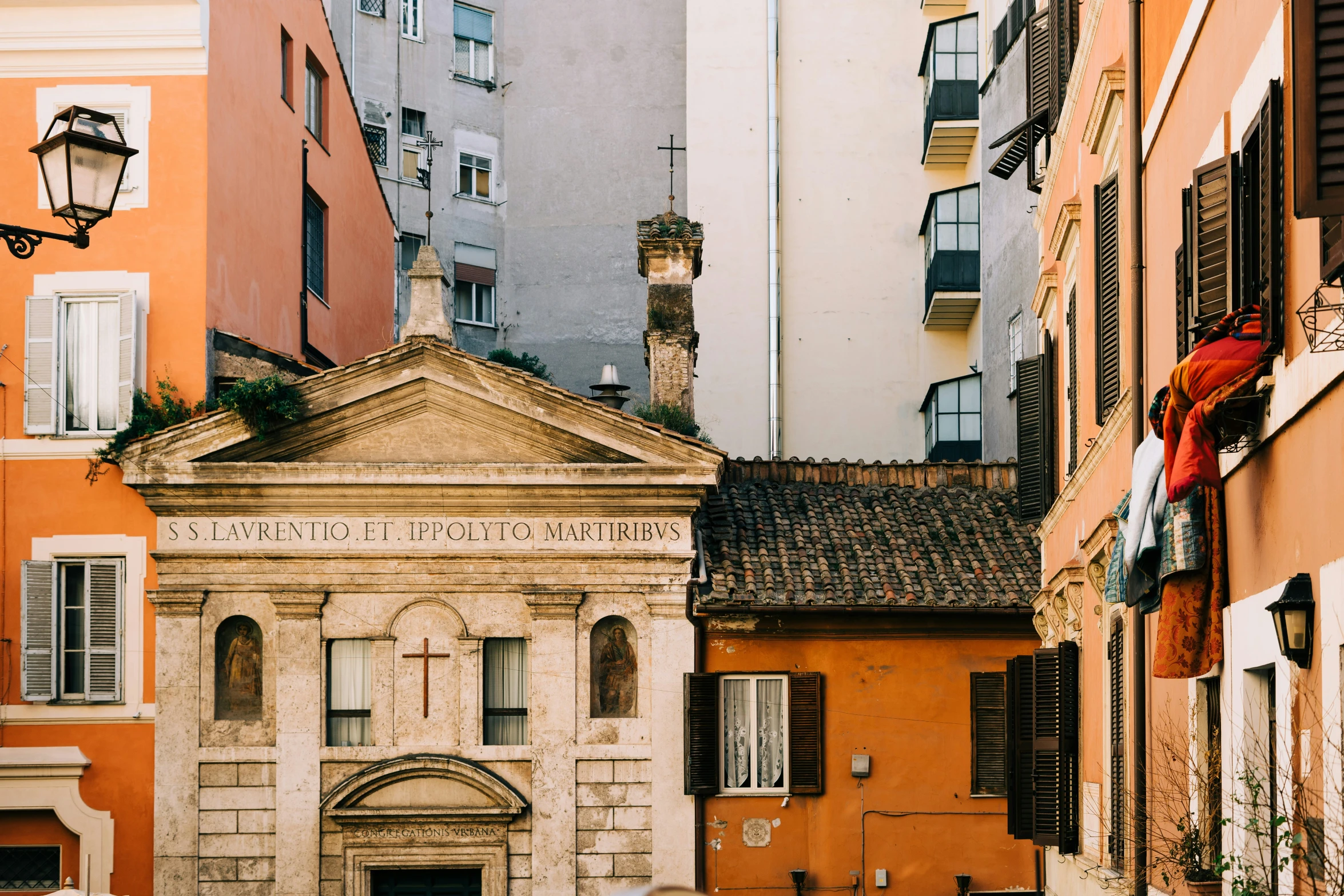 an old building in front of some old buildings