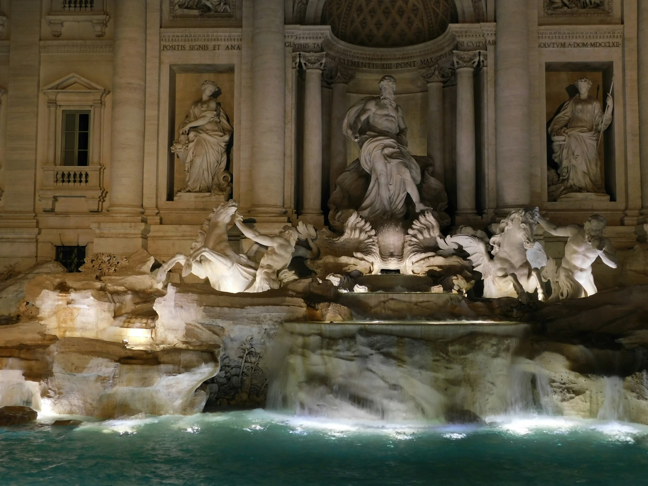 the view from below of statues of the trelis de arcore in a night scene