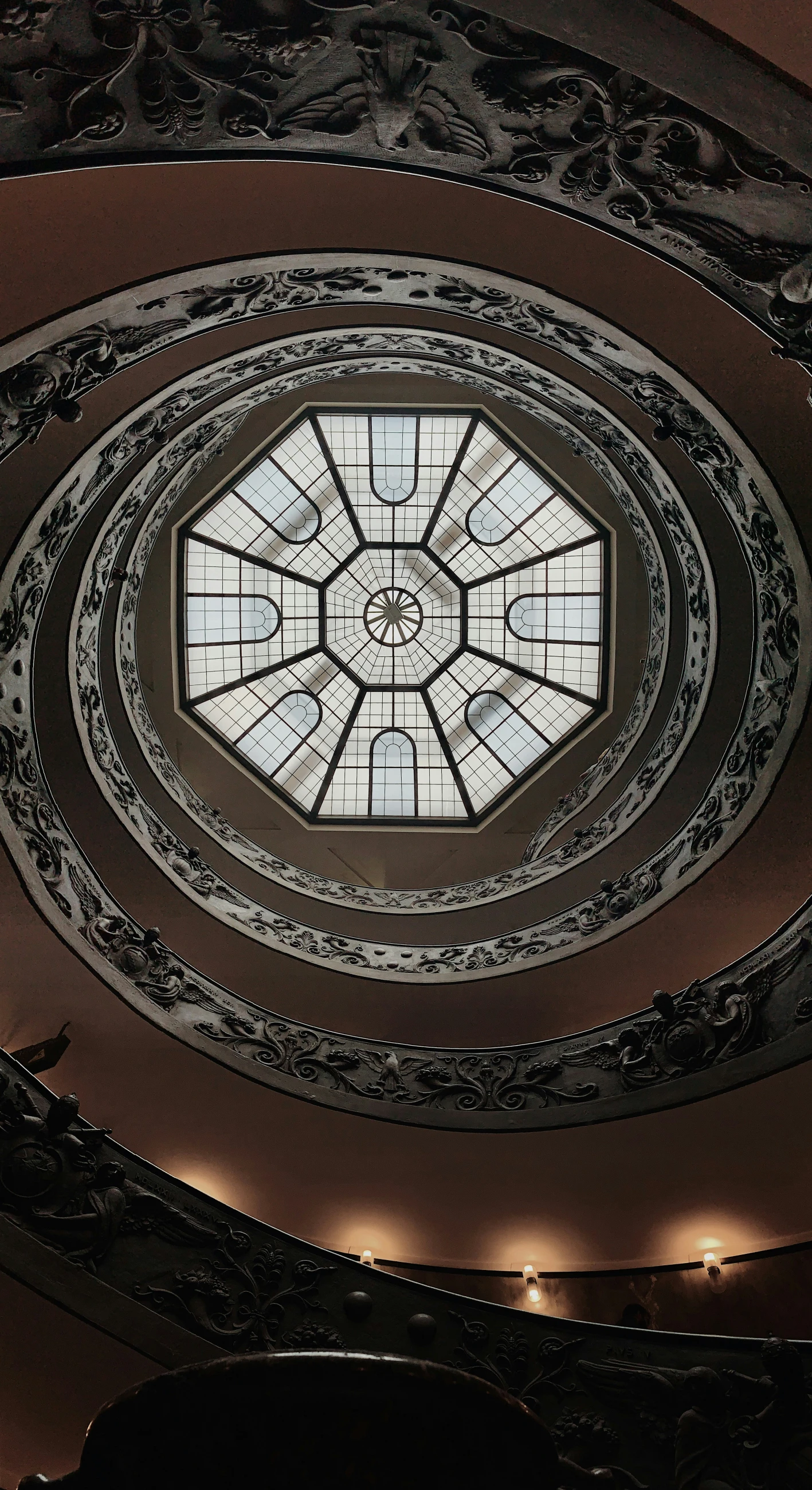 the roof is a circle with the lights coming through