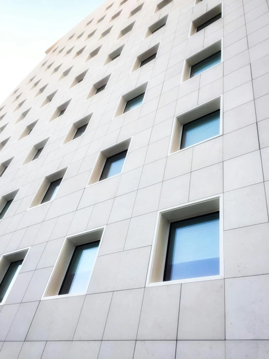 a building with several small windows in the side