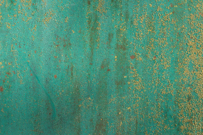 green textured surface with golden speckles on top