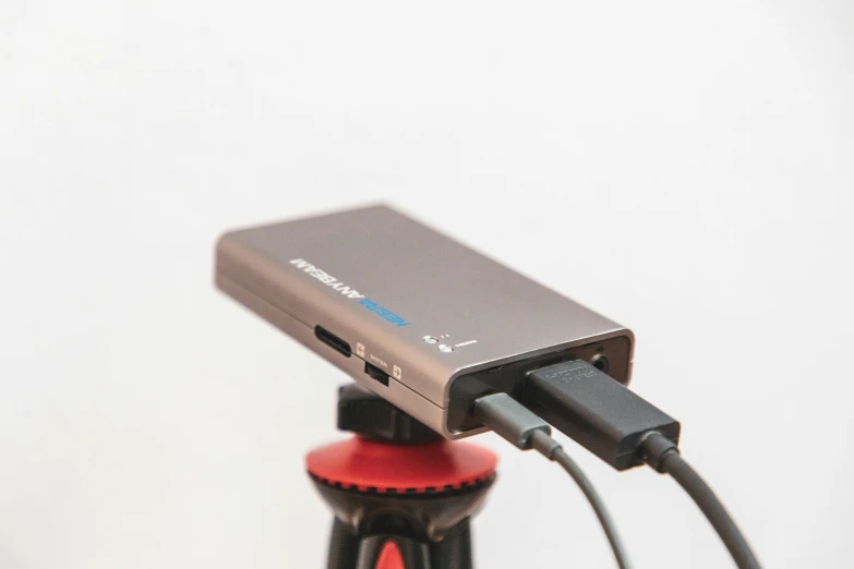 a small electronic device is attached to an electric device