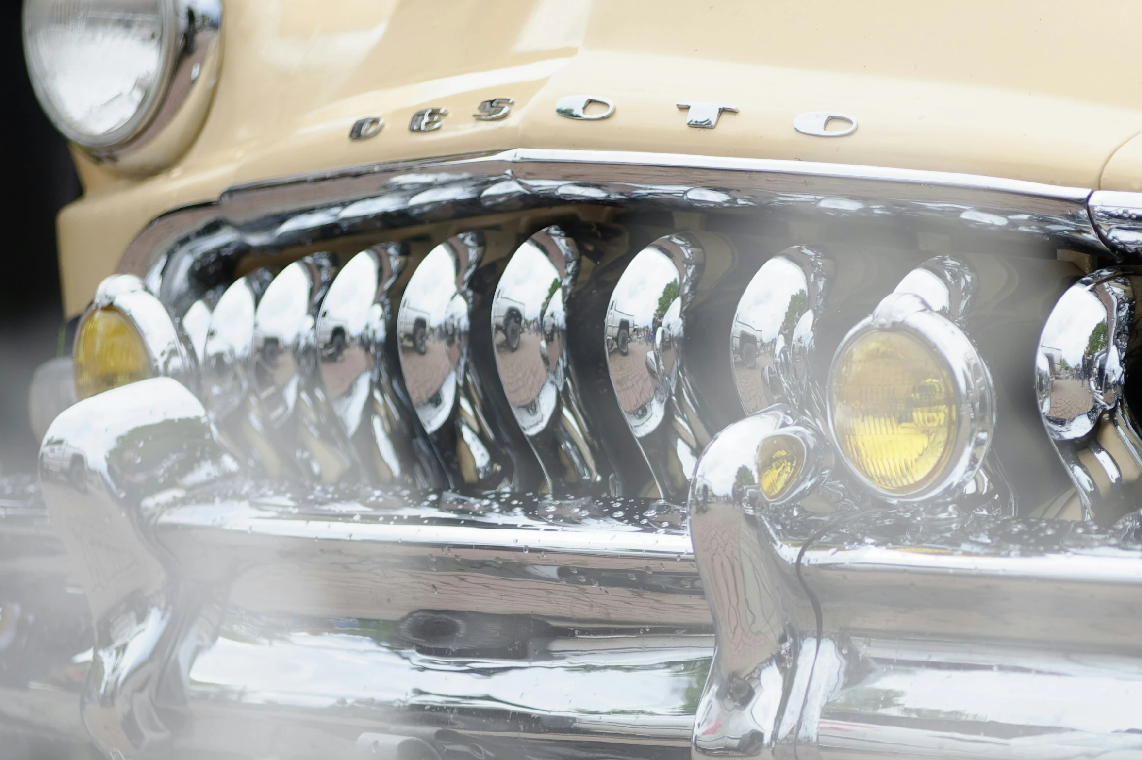 a car front view reflecting light and fog