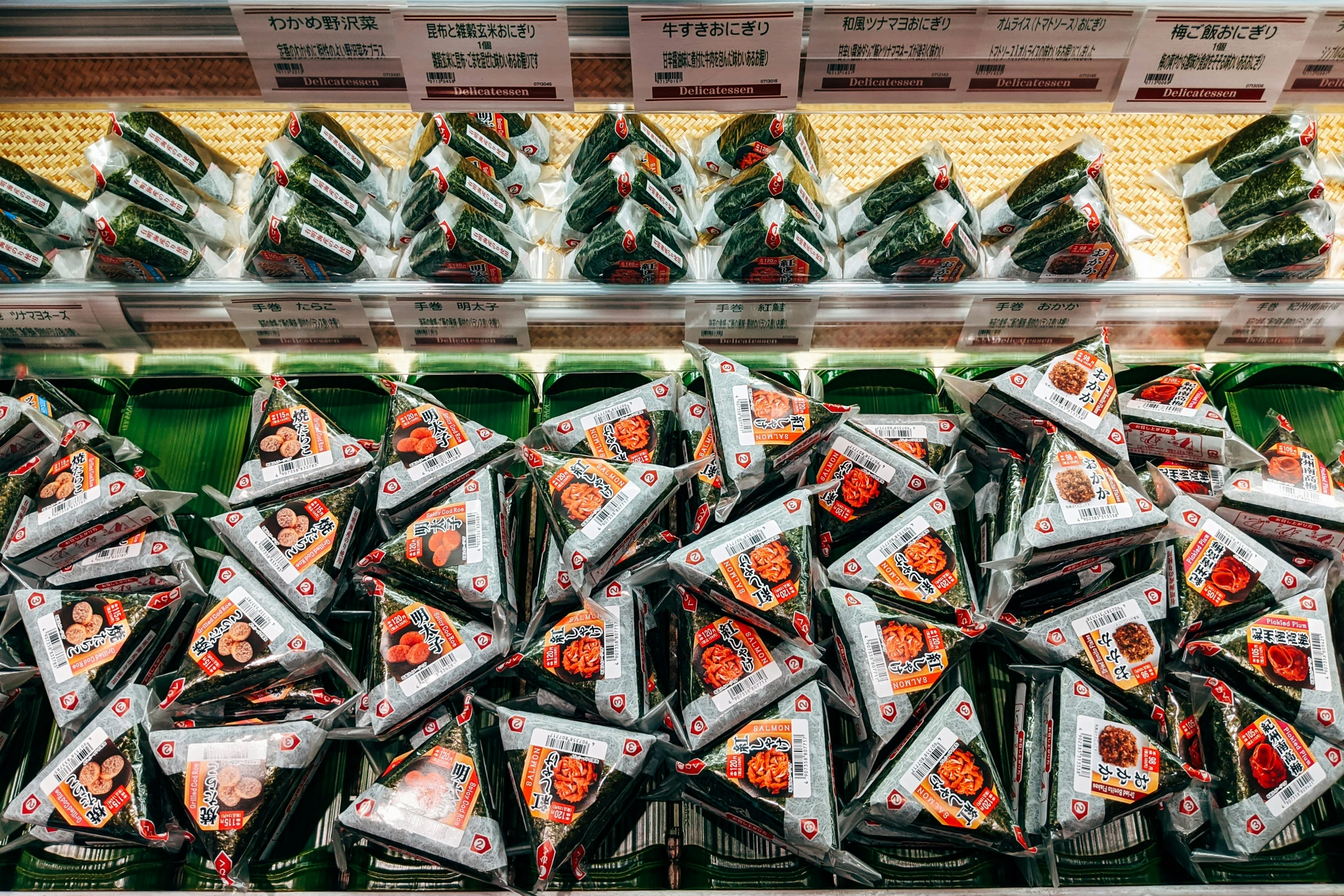 many bags of cookies on display in a display case