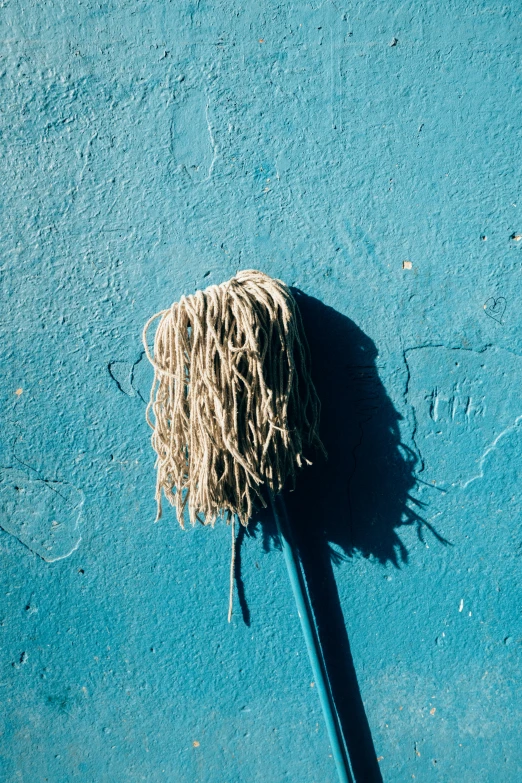 a tube of straw that has been bent up against the ground