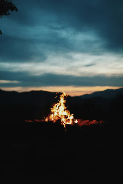 a large fire lit up in the dark