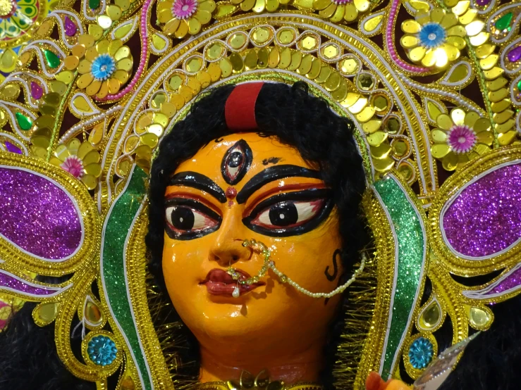 an elaborately decorated statue in various colors