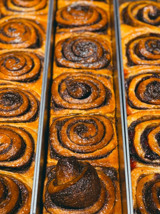 a few brown buns on top of each other