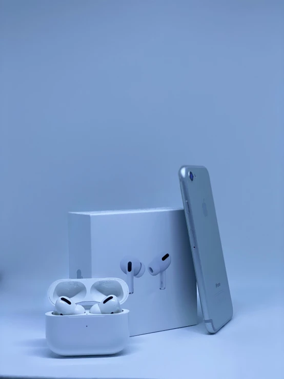 an apple product set on a white background with its box