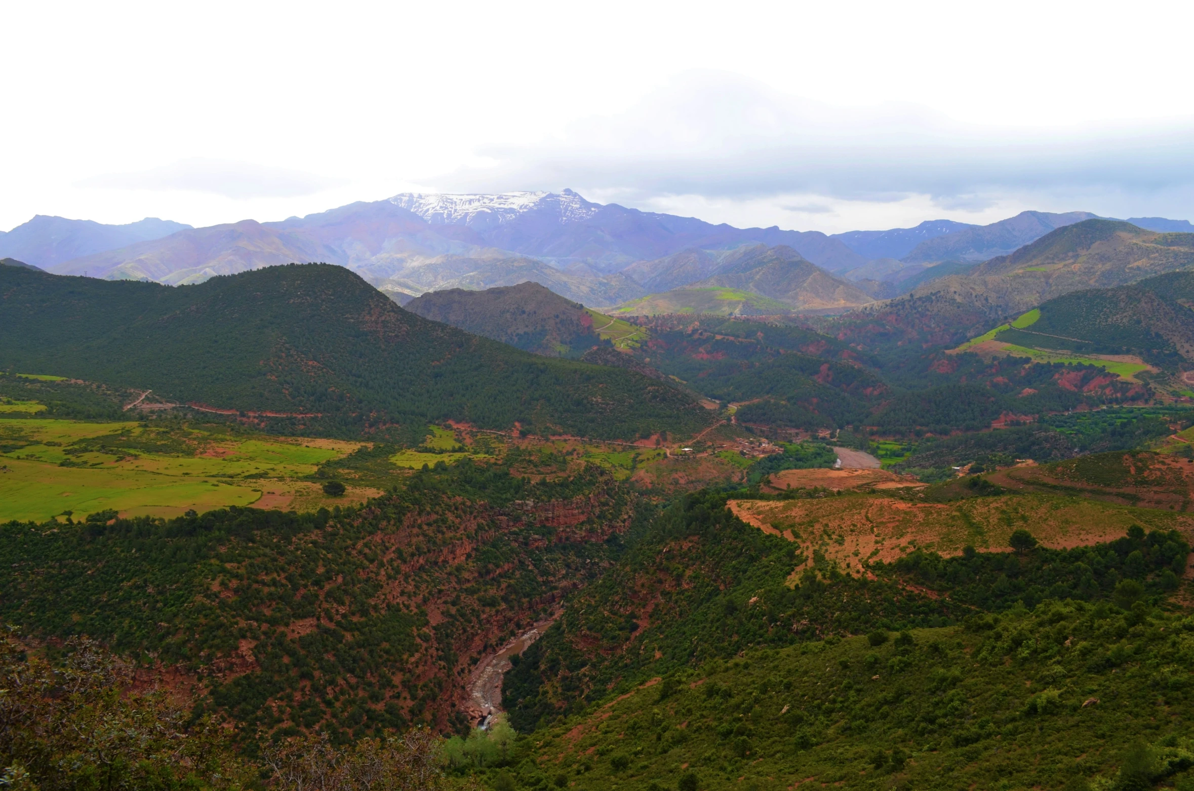 the top of a mountain, with a valley in the middle