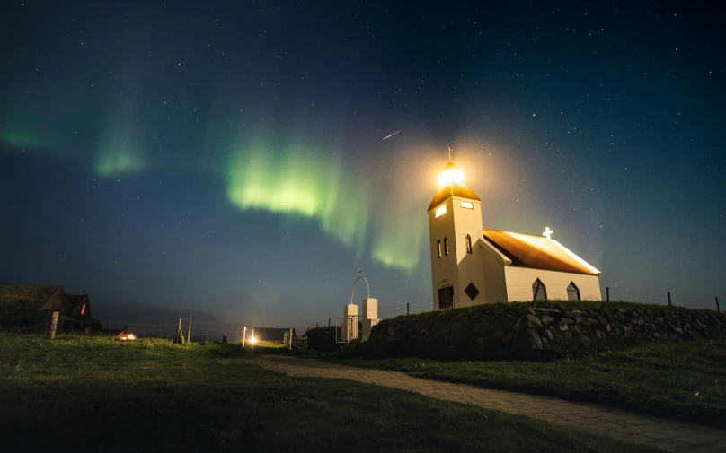 a lighthouse with a lot of lights on top of it