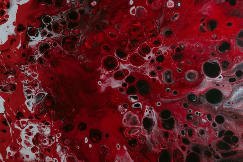 painting with large bubbles and spots on a red and white surface