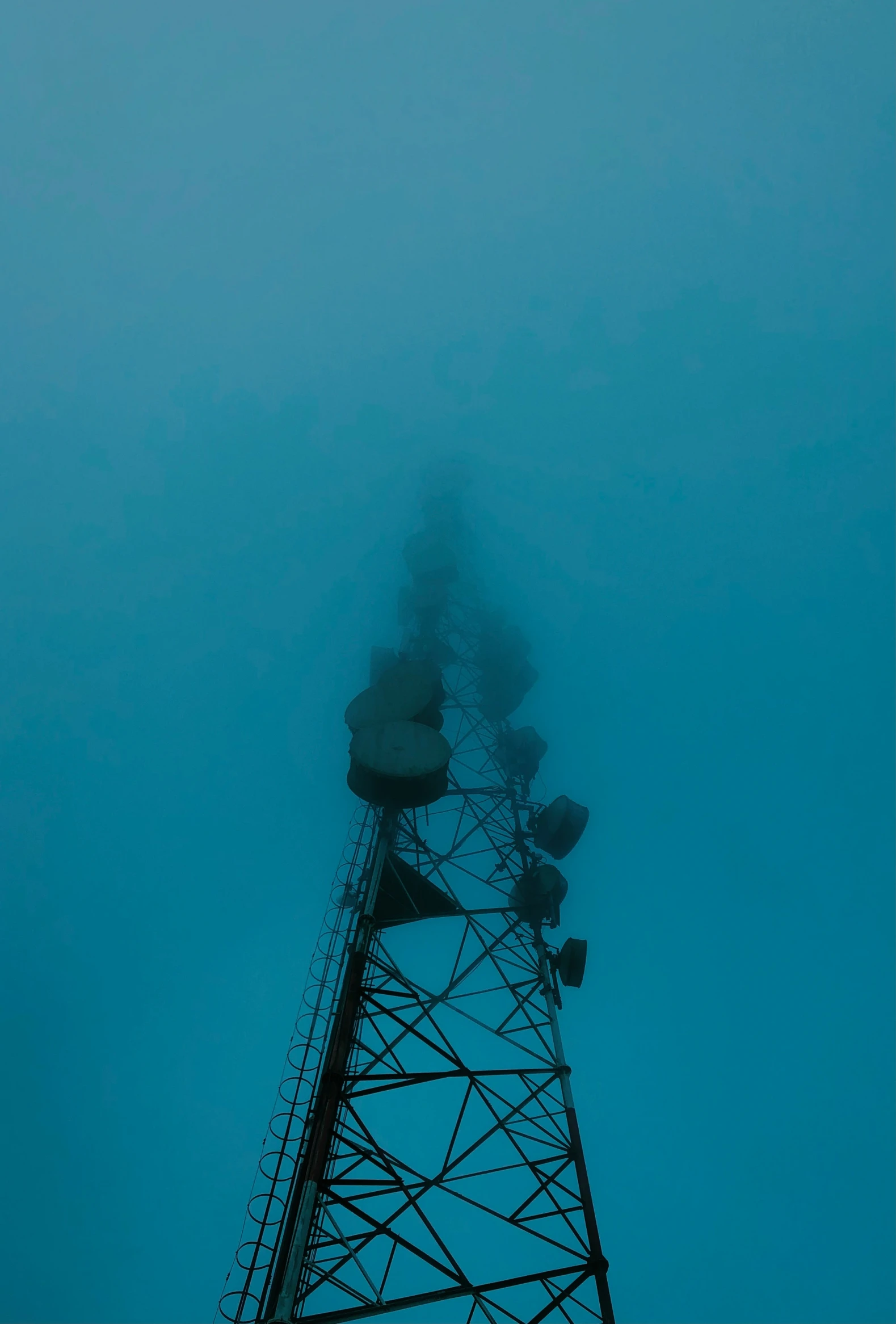 tower in the middle of blue skies and some clouds