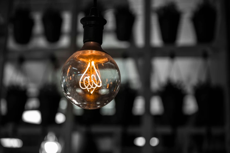 a light bulb is lit up above the wall