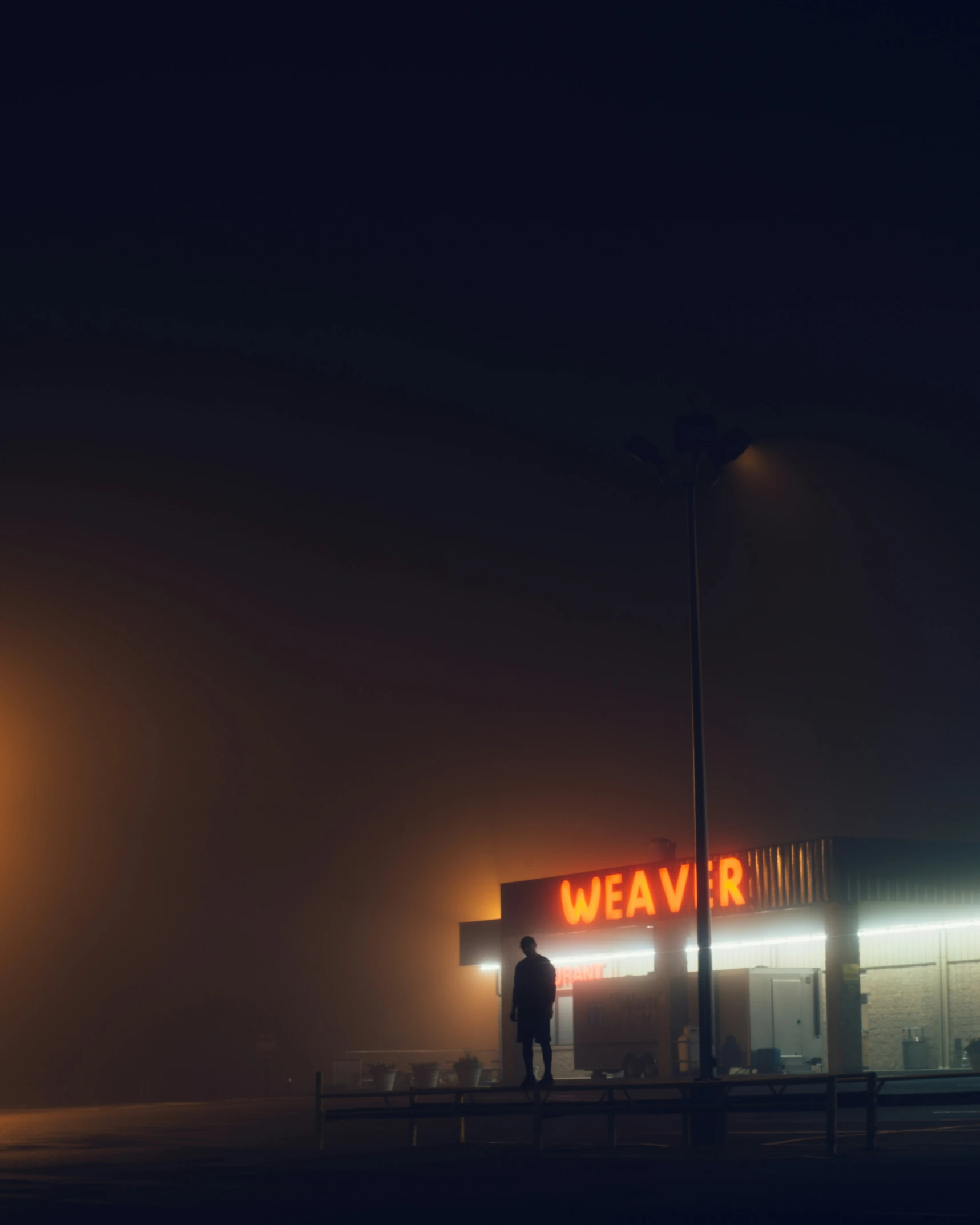 person in dark looking fog in a gas station