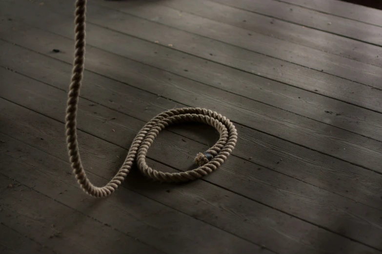 a rope on top of a wooden deck