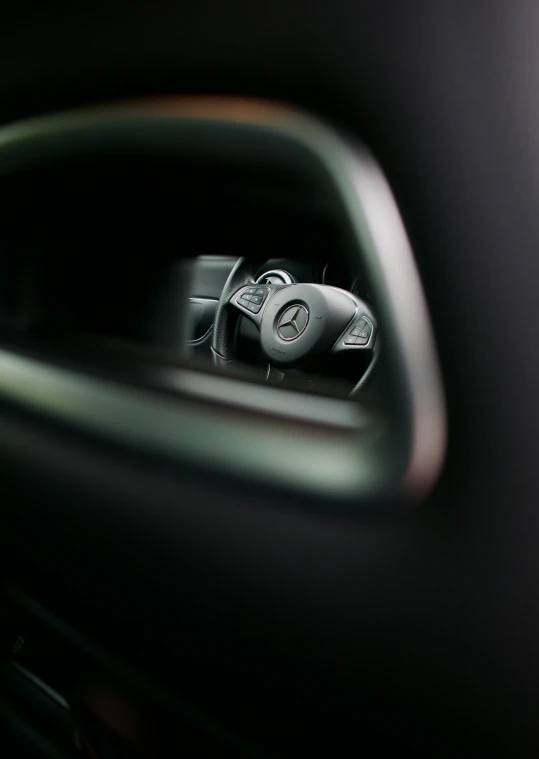 the interior of a car showing an empty seat