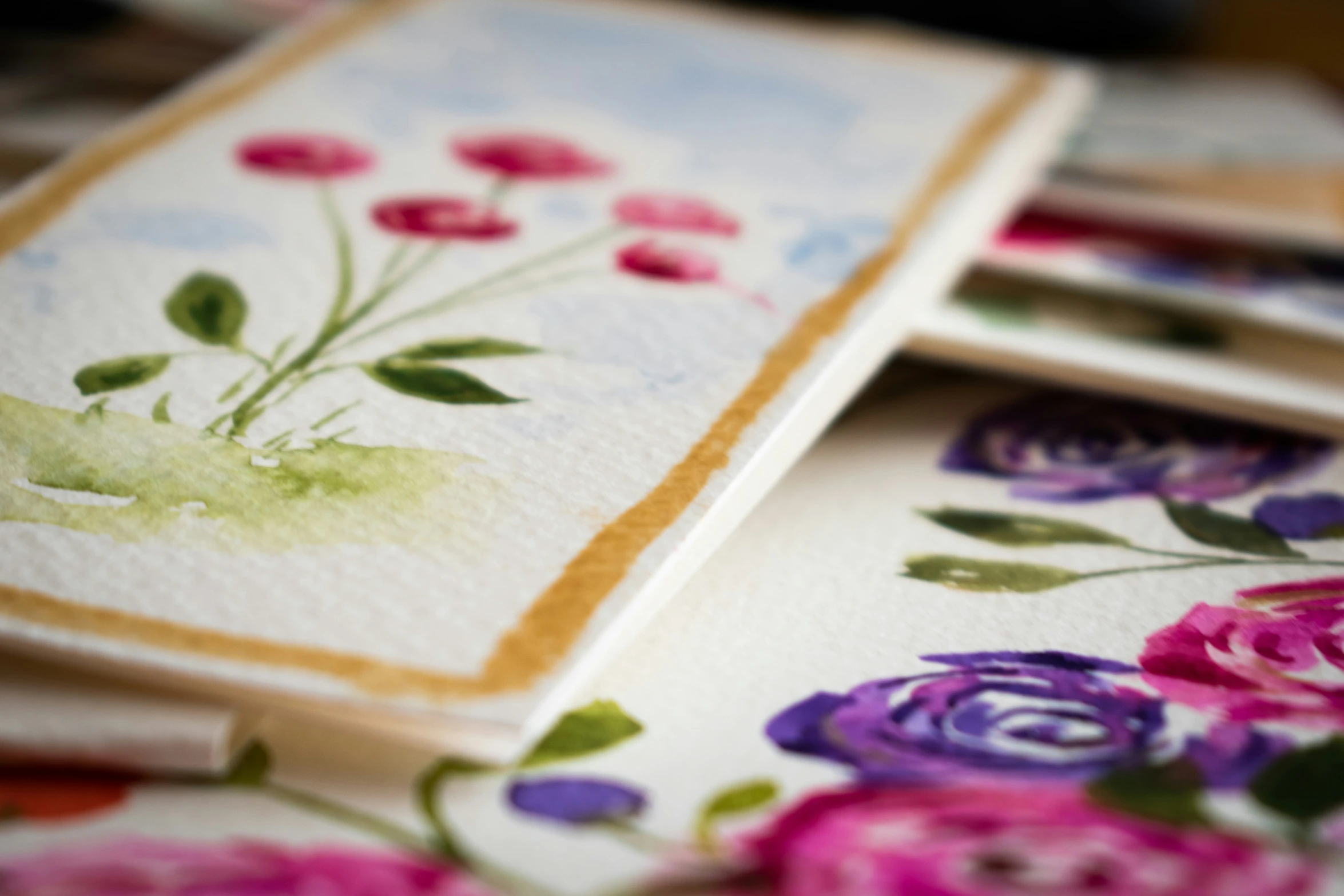 a close up of many card designs on a surface