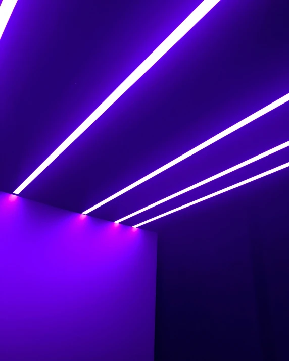a purple ceiling with a clock in the middle of it