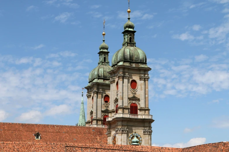 an old cathedral with two towers and the top point of it