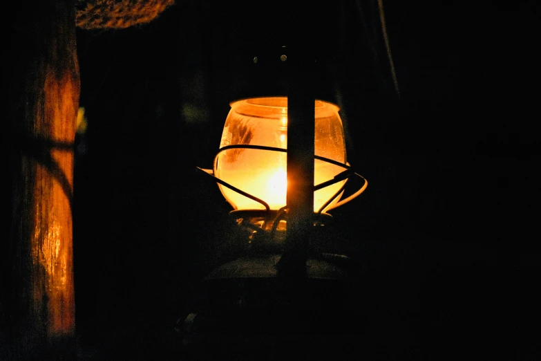 the lantern is lit and has light shining