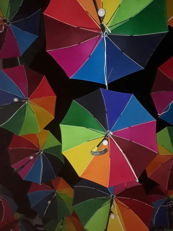 a po of a bunch of umbrellas together